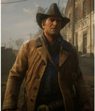 Character in a western setting wearing a brown coat and hat, standing in front of an old building.