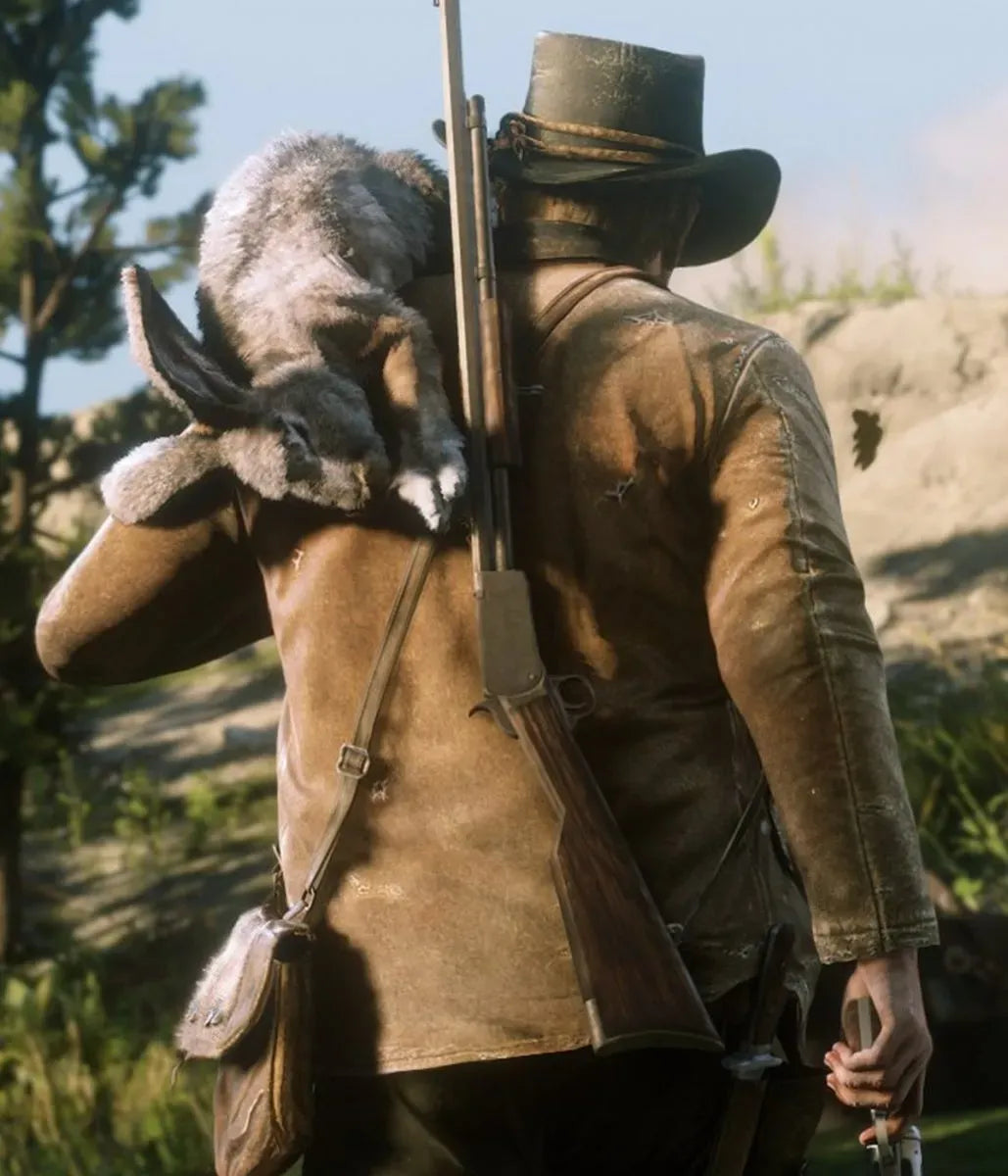 Person in a western outfit with a rifle and animal skin, standing in a natural landscape.